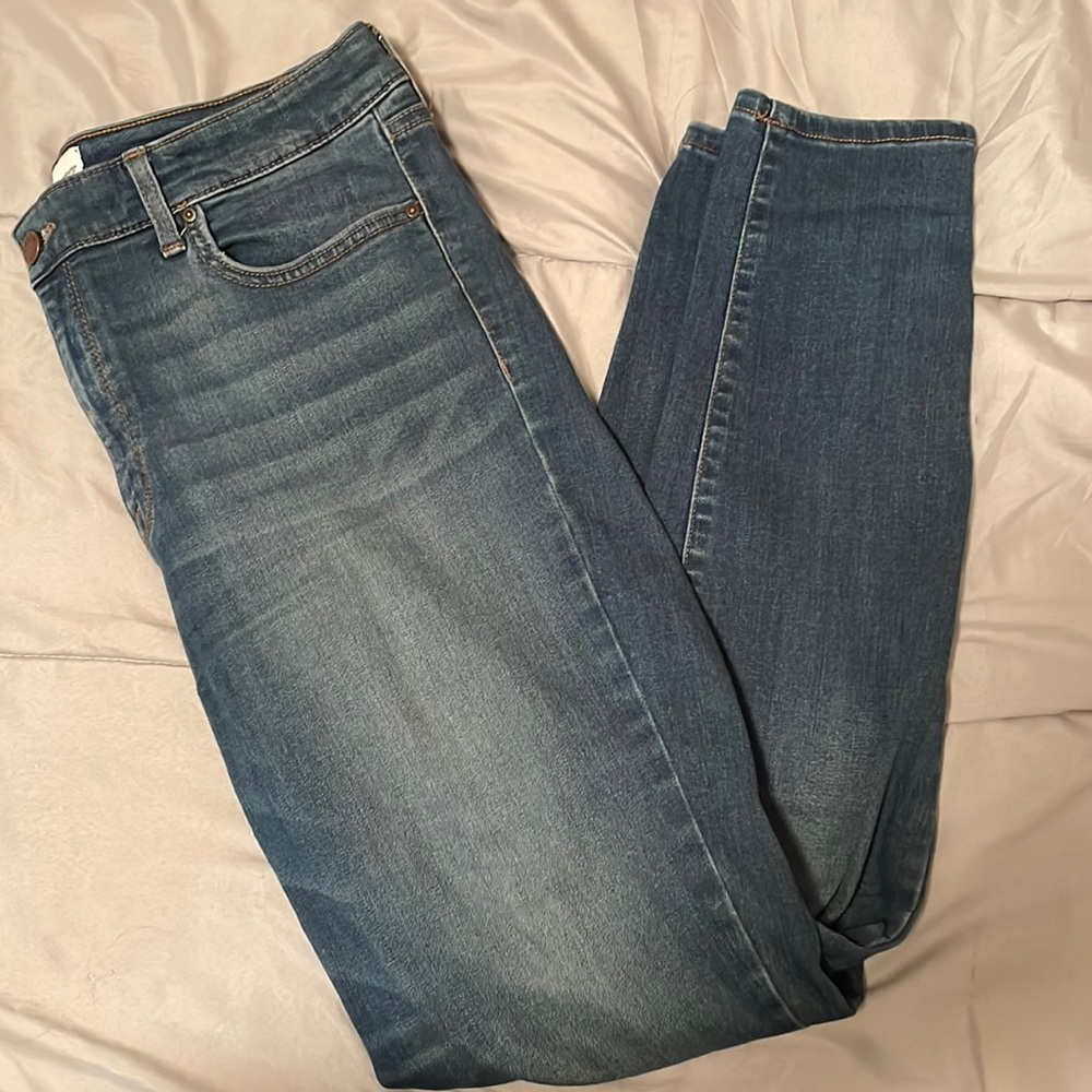 Dark wash light distress stretch jean